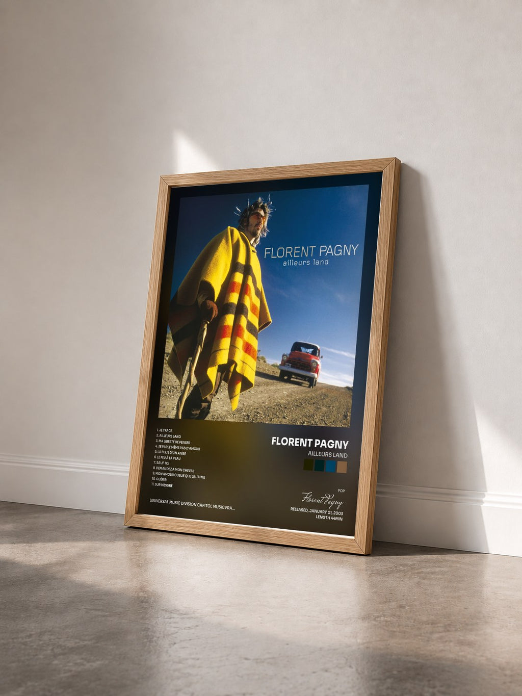 #bois Tableau de l'album Ailleurs Land de Florent Pagny vu de trois quarts, cadre en bois brut