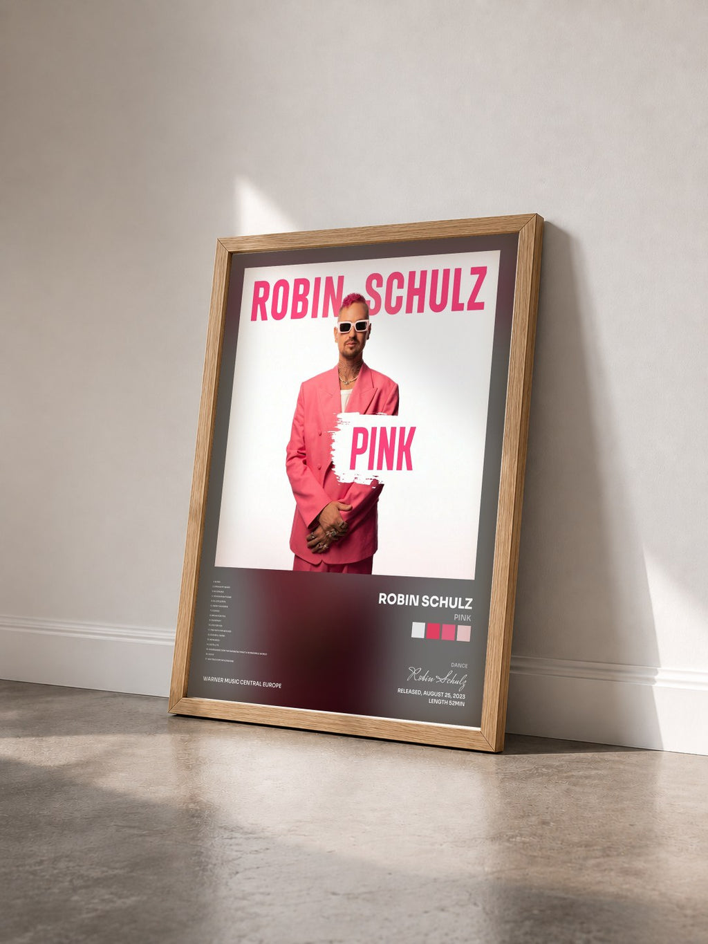 #bois Tableau de l'album Pink de Robin Schulz vu de trois quarts, cadre en bois brut