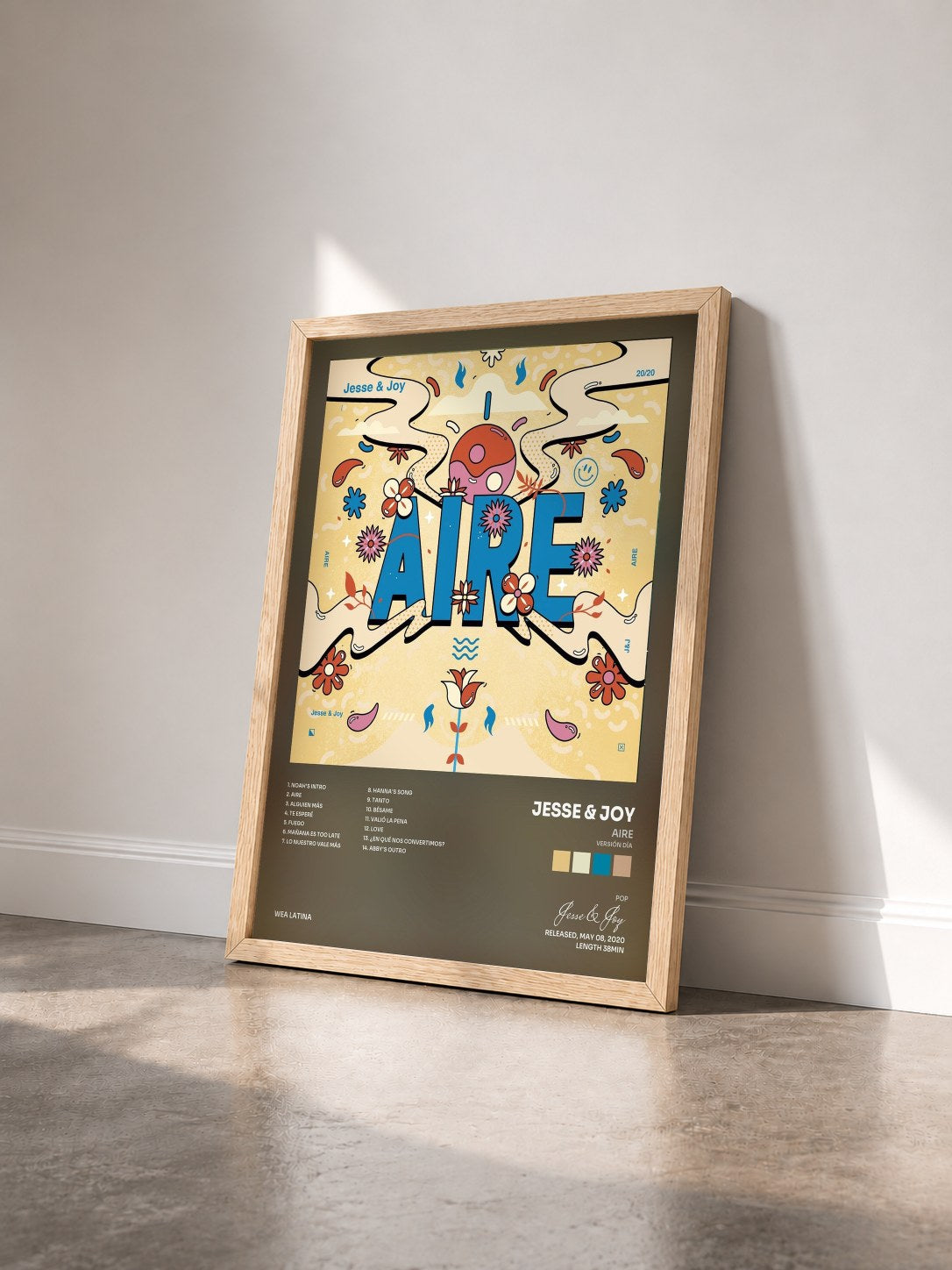 #bois Tableau de l'album Aire (Versión Día) de Jesse & Joy vu de trois quarts, cadre en bois brut