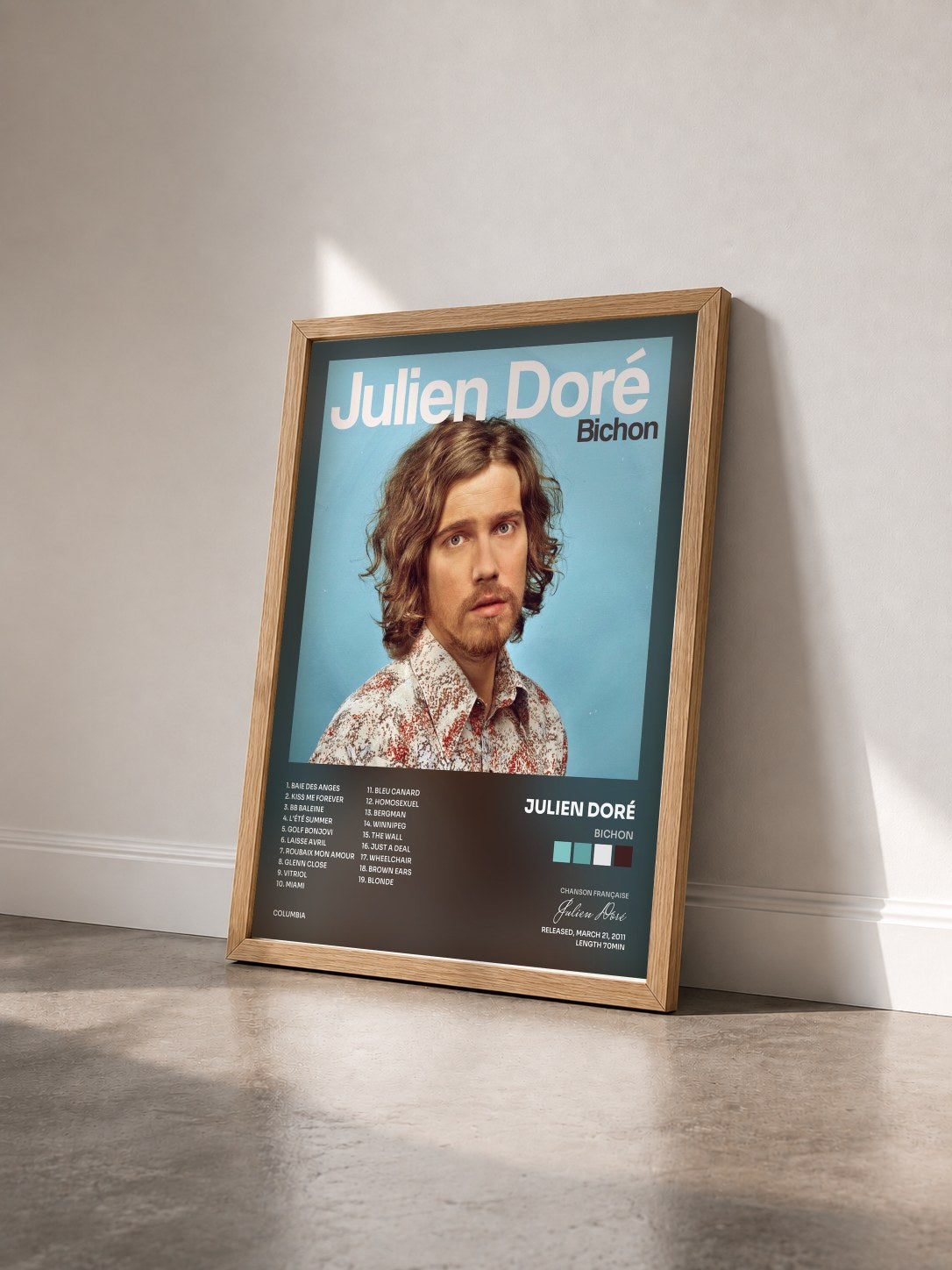 #bois Tableau de l'album Bichon de Julien Doré vu de trois quarts, cadre en bois brut