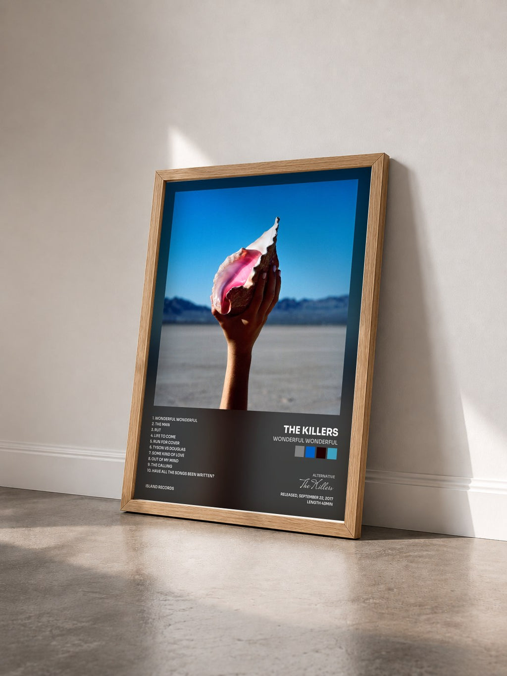 #bois Tableau de l'album Wonderful Wonderful de The Killers vu de trois quarts, cadre en bois brut