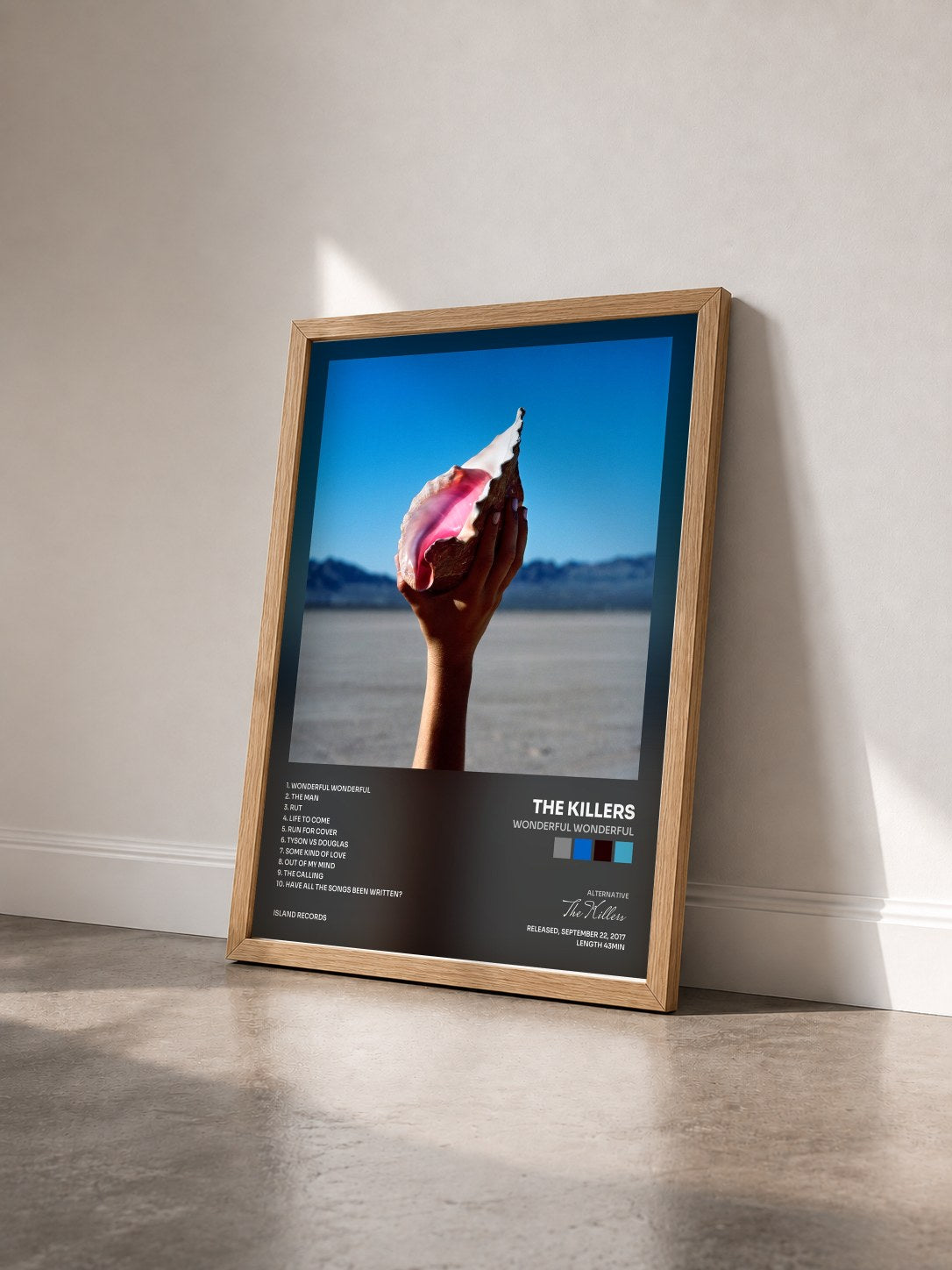 #bois Tableau de l'album Wonderful Wonderful de The Killers vu de trois quarts, cadre en bois brut