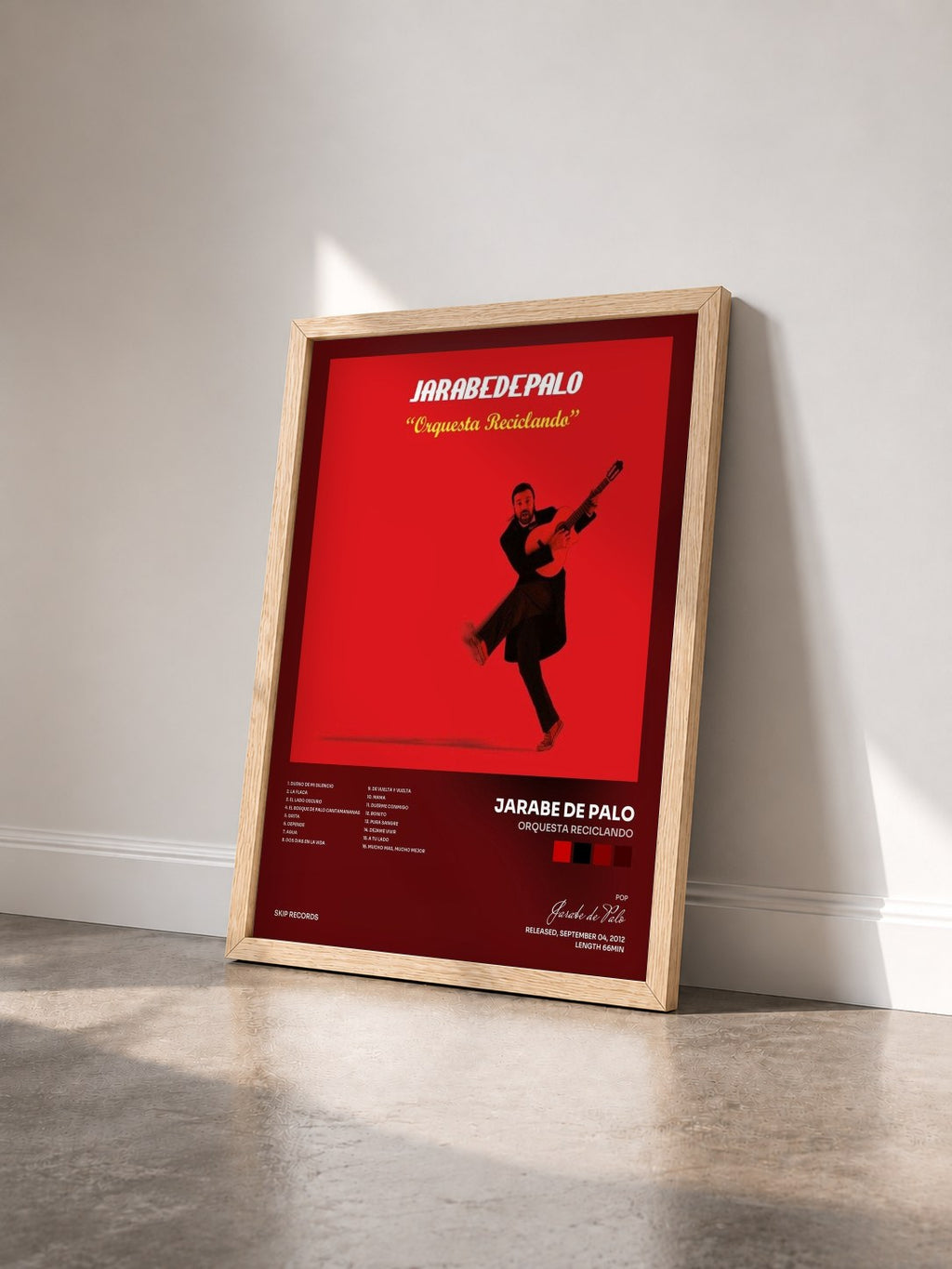#bois Tableau de l'album Orquesta Reciclando de Jarabe de Palo vu de trois quarts, cadre en bois brut