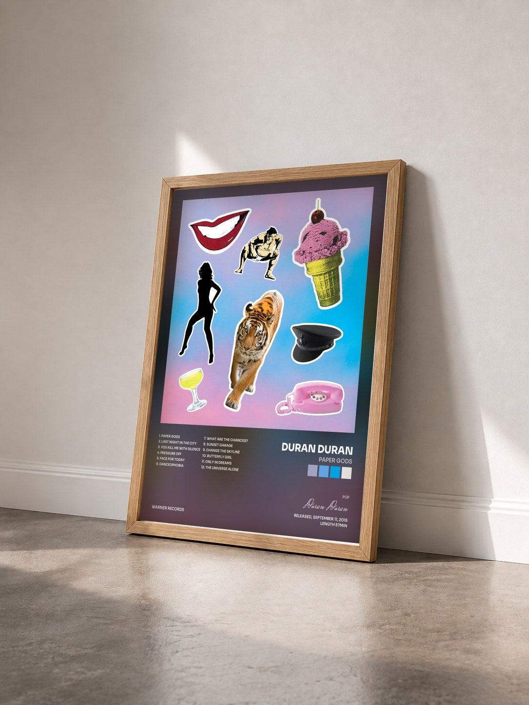 #bois Tableau de l'album Paper Gods de Duran Duran vu de trois quarts, cadre en bois brut