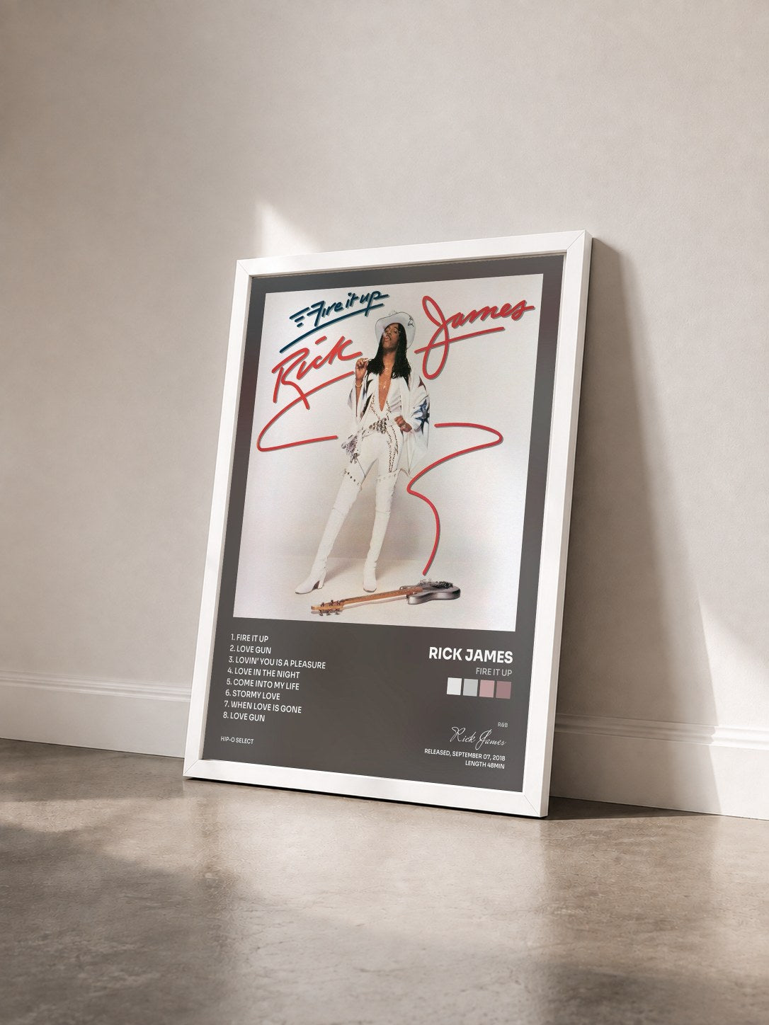 #blanc Tableau de l'album Fire It Up de Rick James vu de trois quarts, cadre blanc