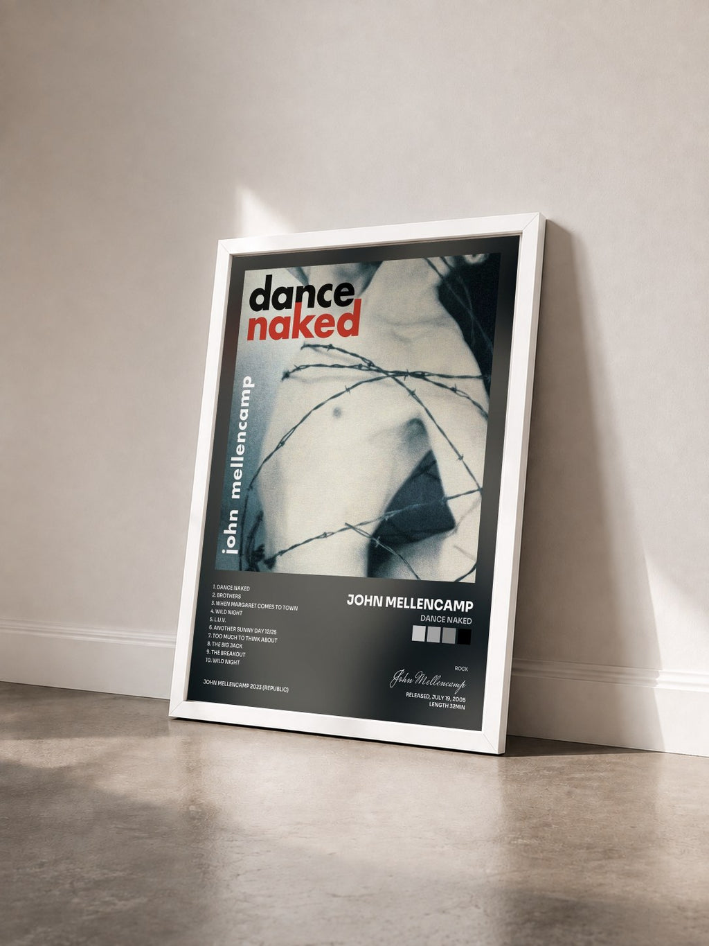 #blanc Tableau de l'album Dance Naked de John Mellencamp vu de trois quarts, cadre blanc