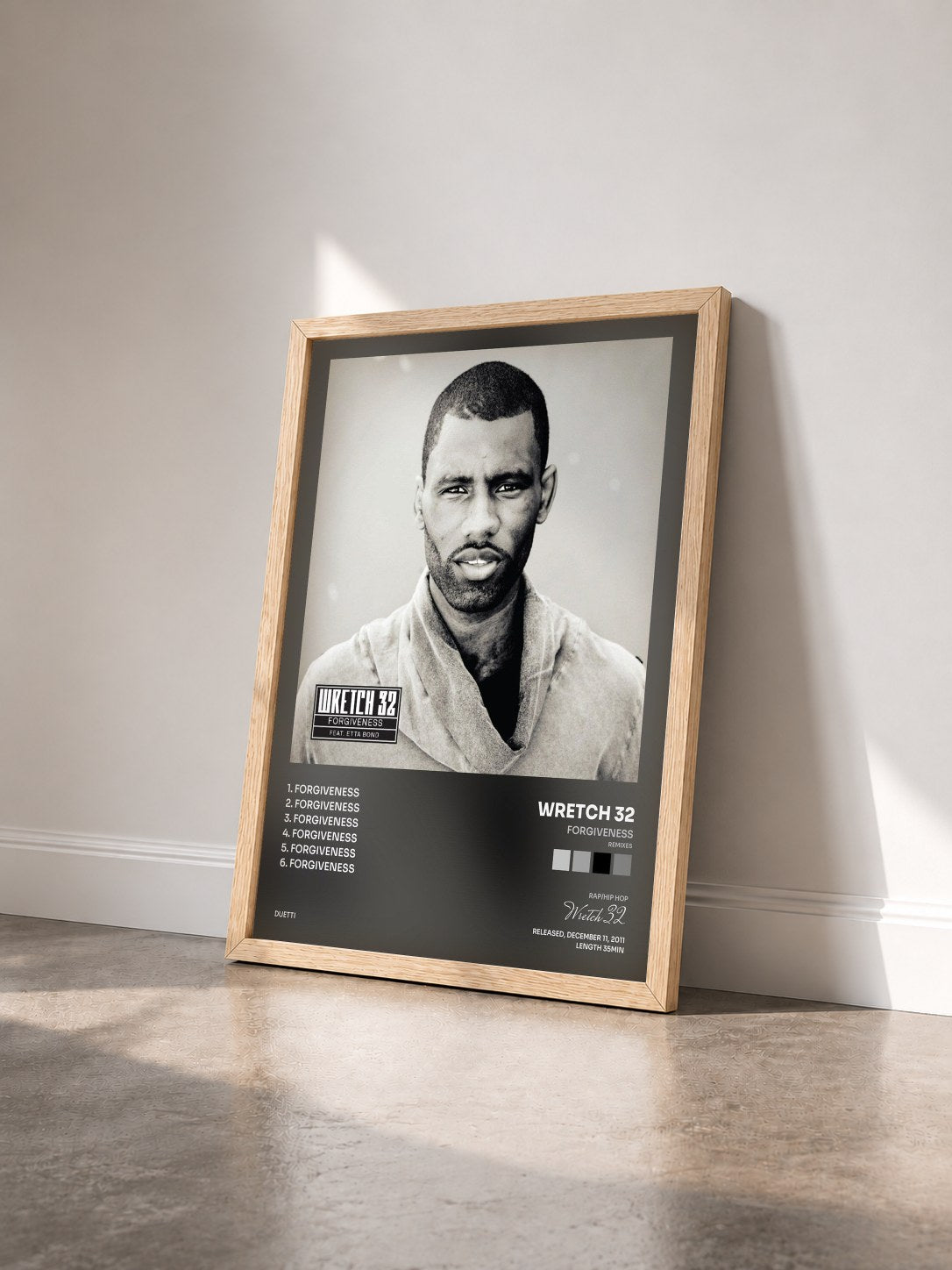 #bois Tableau de l'album Forgiveness (Remixes) de Wretch 32 vu de trois quarts, cadre en bois brut