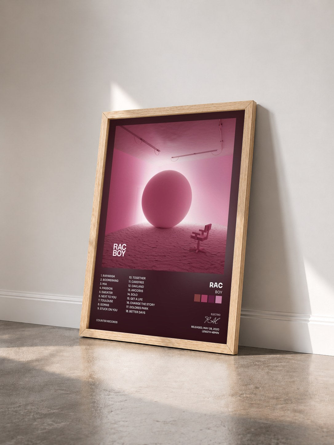#bois Tableau de l'album BOY de RAC vu de trois quarts, cadre en bois brut