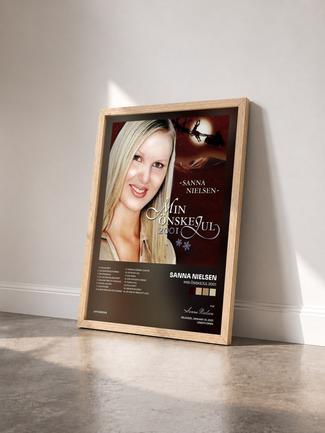 #bois Tableau de l'album Min önskejul 2001 de Sanna Nielsen vu de trois quarts, cadre en bois brut