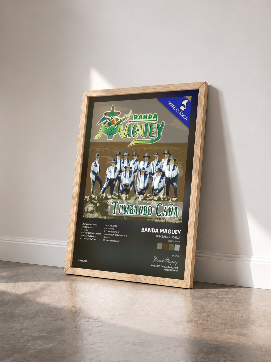 #bois Tableau de l'album Tumbando Caña (Serie Clásica) de Banda Maguey vu de trois quarts, cadre en bois brut