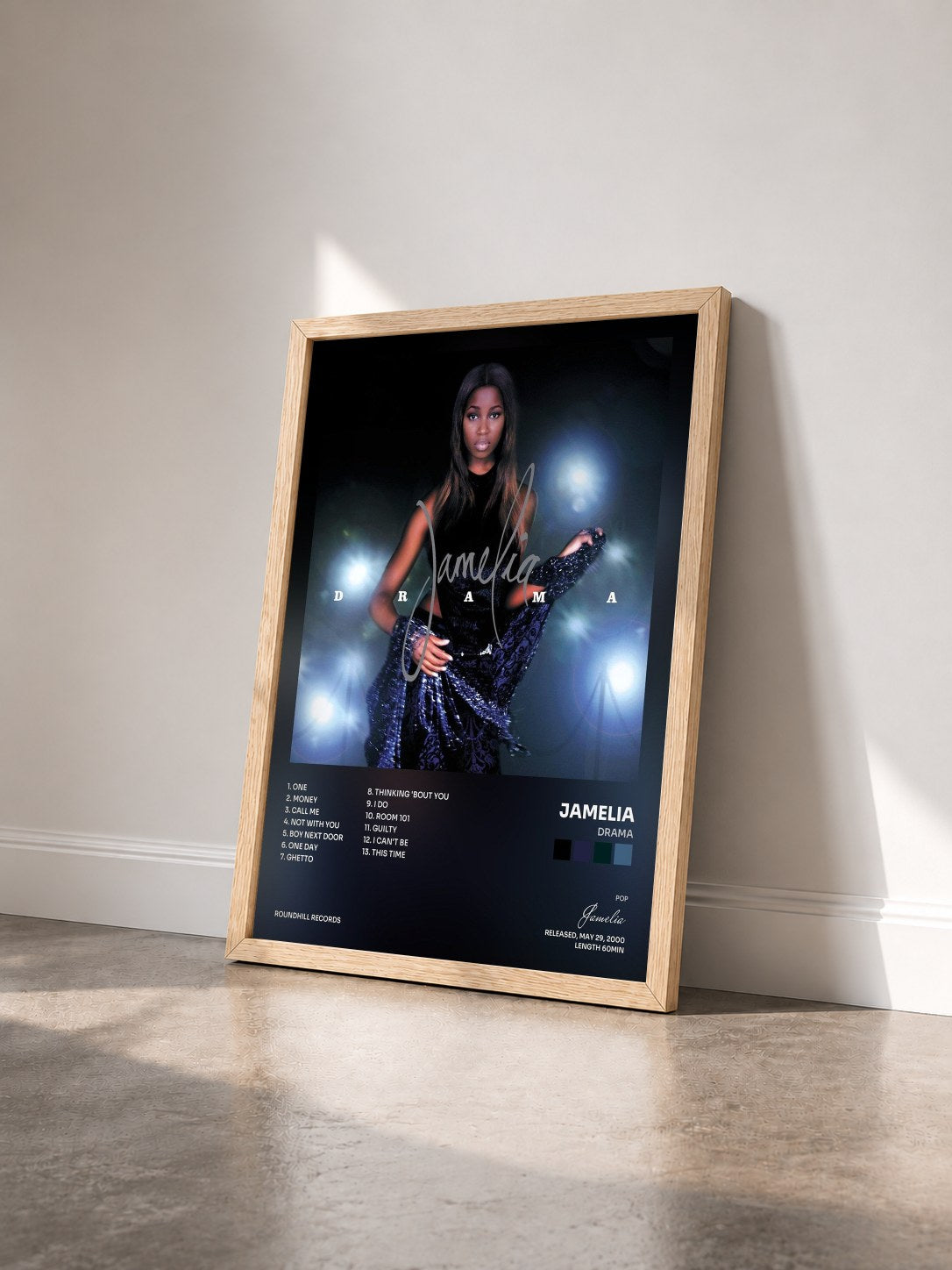 #bois Tableau de l'album Drama de Jamelia vu de trois quarts, cadre en bois brut