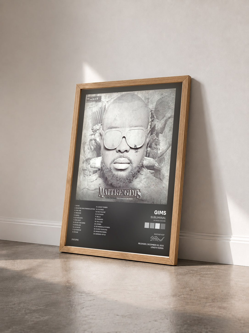 #bois Tableau de l'album Subliminal (La face cachée) de GIMS vu de trois quarts, cadre en bois brut