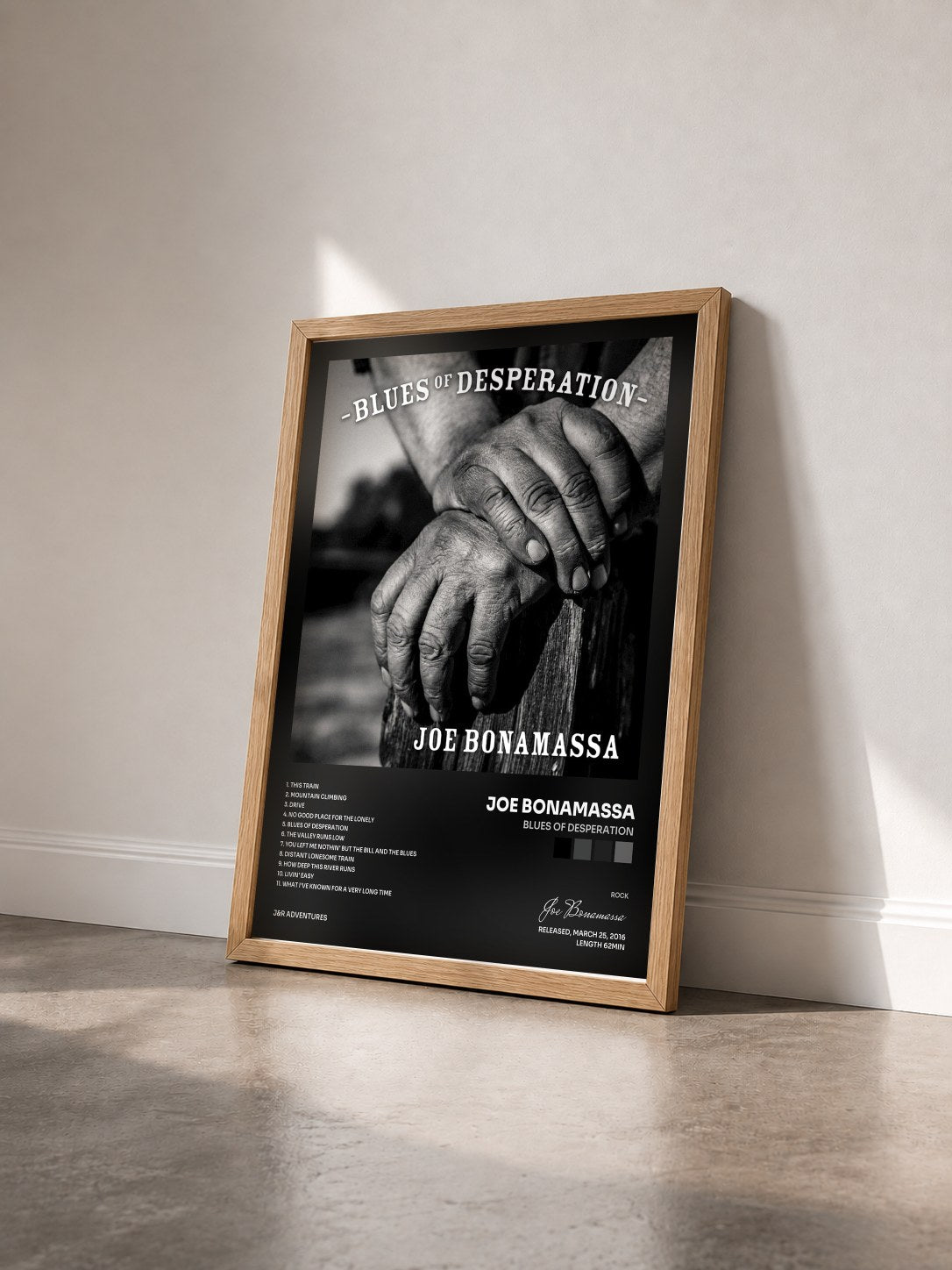 #bois Tableau de l'album Blues Of Desperation de Joe Bonamassa vu de trois quarts, cadre en bois brut