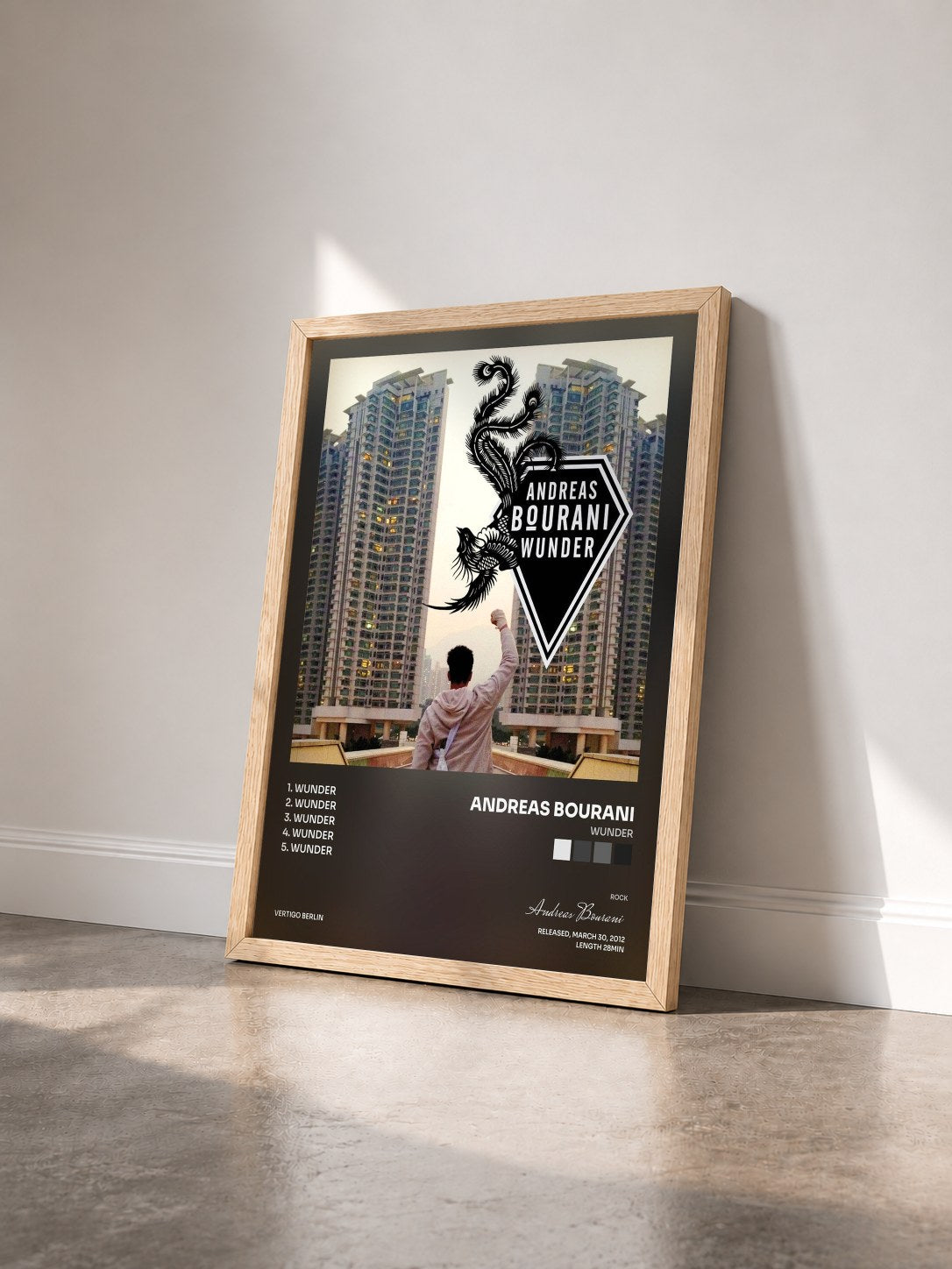#bois Tableau de l'album Wunder de Andreas Bourani vu de trois quarts, cadre en bois brut