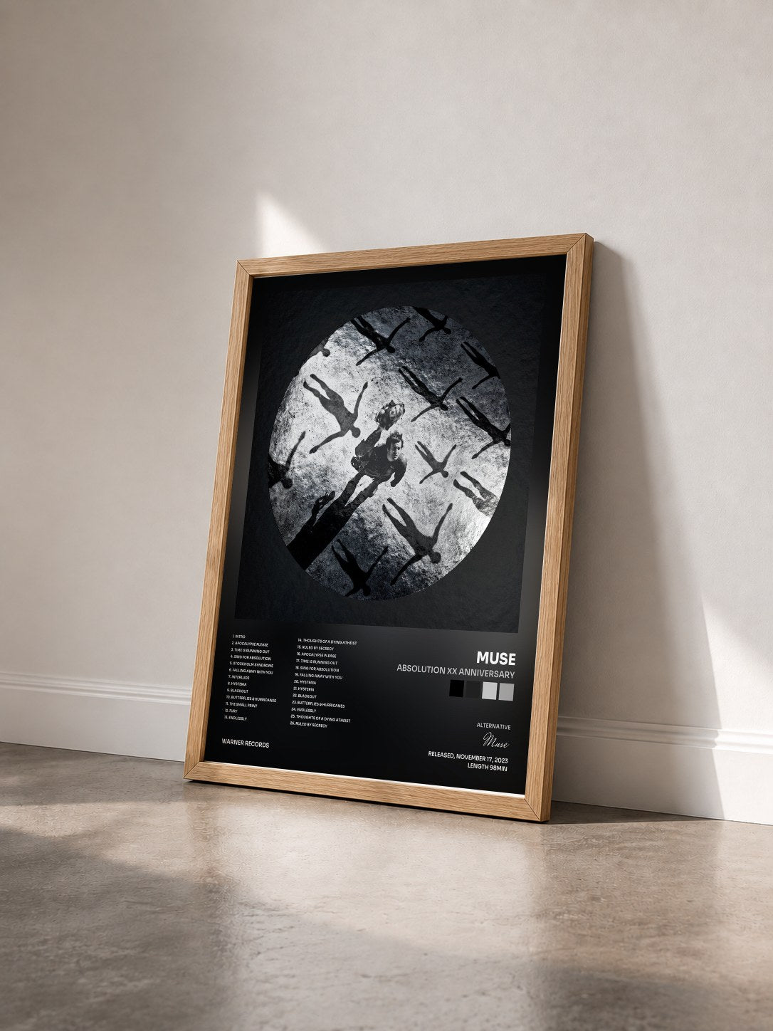 #bois Tableau de l'album Absolution XX Anniversary de Muse vu de trois quarts, cadre en bois brut
