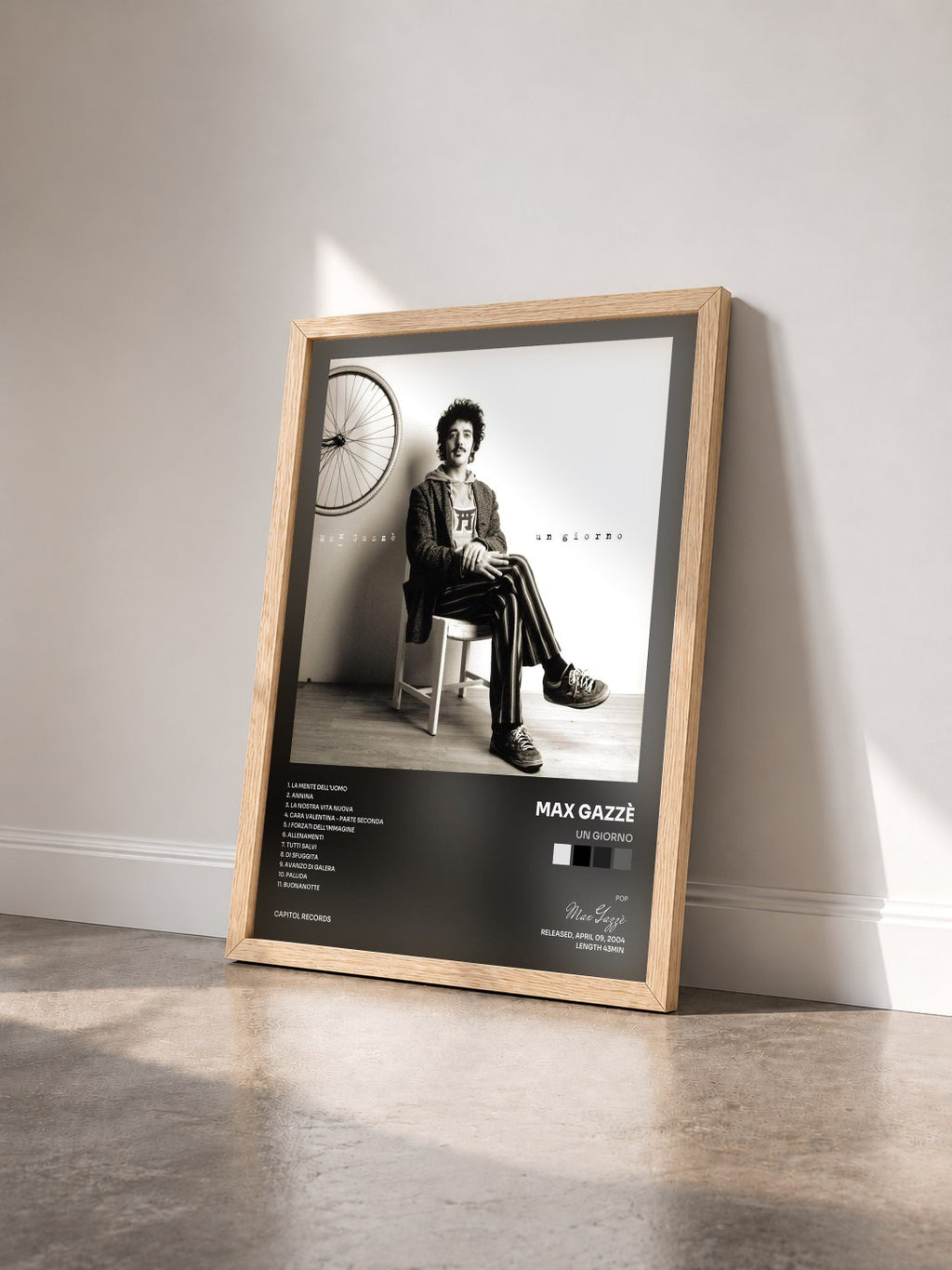 #bois Tableau de l'album Un Giorno de Max Gazzè vu de trois quarts, cadre en bois brut