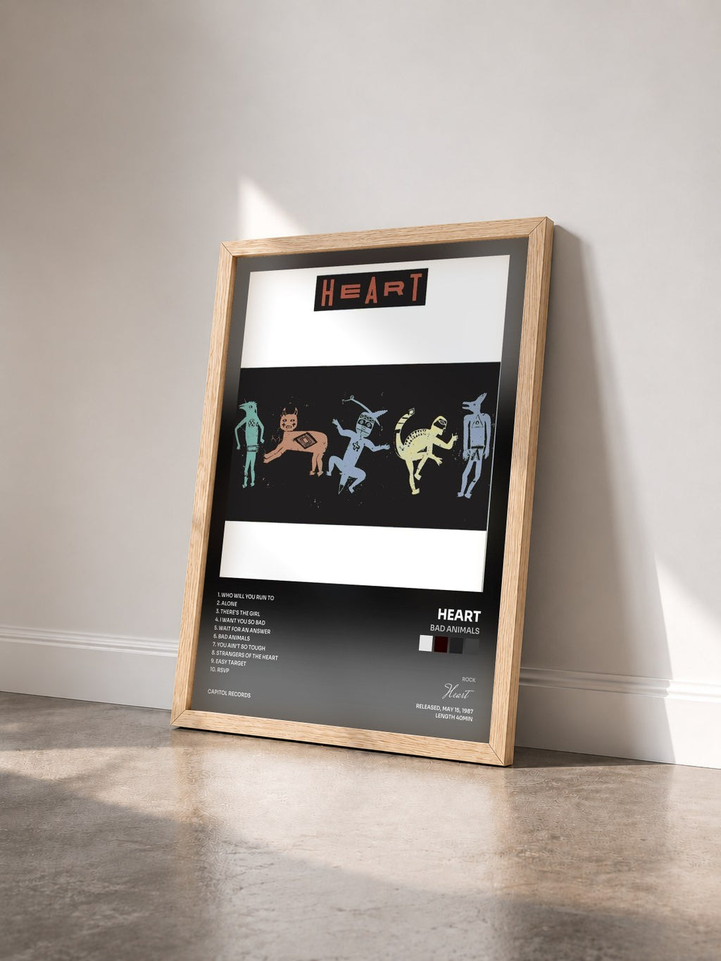 #bois Tableau de l'album Bad Animals de Heart vu de trois quarts, cadre en bois brut