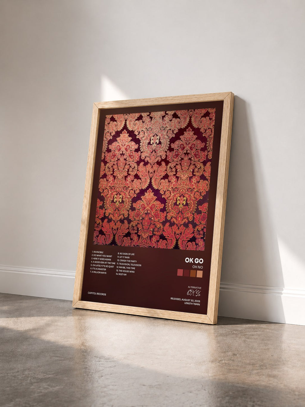 #bois Tableau de l'album Oh No de OK Go vu de trois quarts, cadre en bois brut