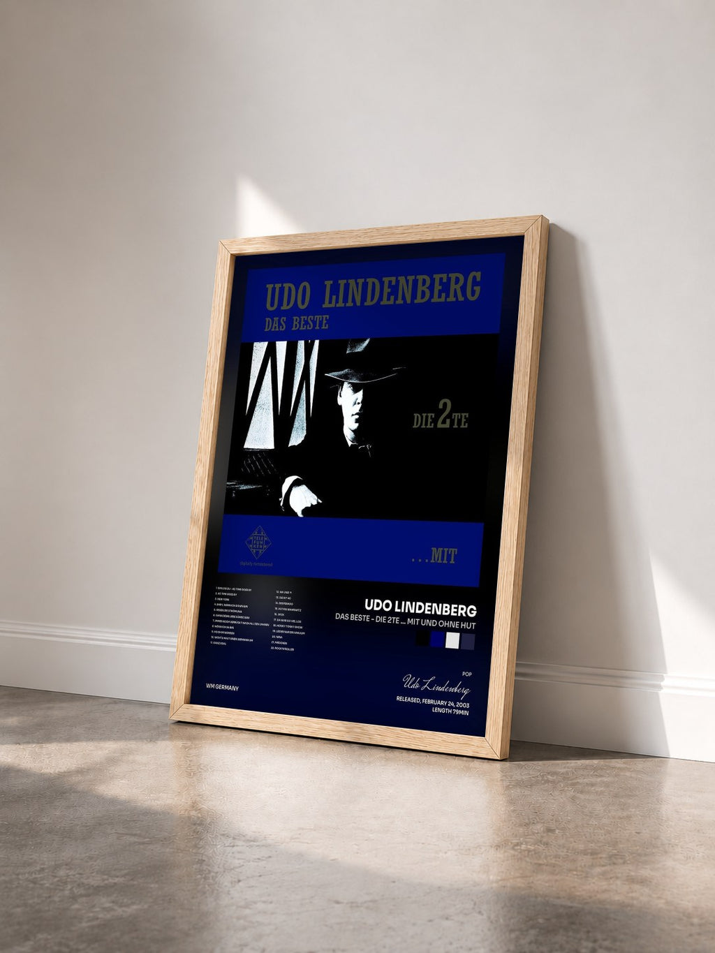 #bois Tableau de l'album Das Beste - Die 2te ... Mit und ohne Hut de Udo Lindenberg vu de trois quarts, cadre en bois brut
