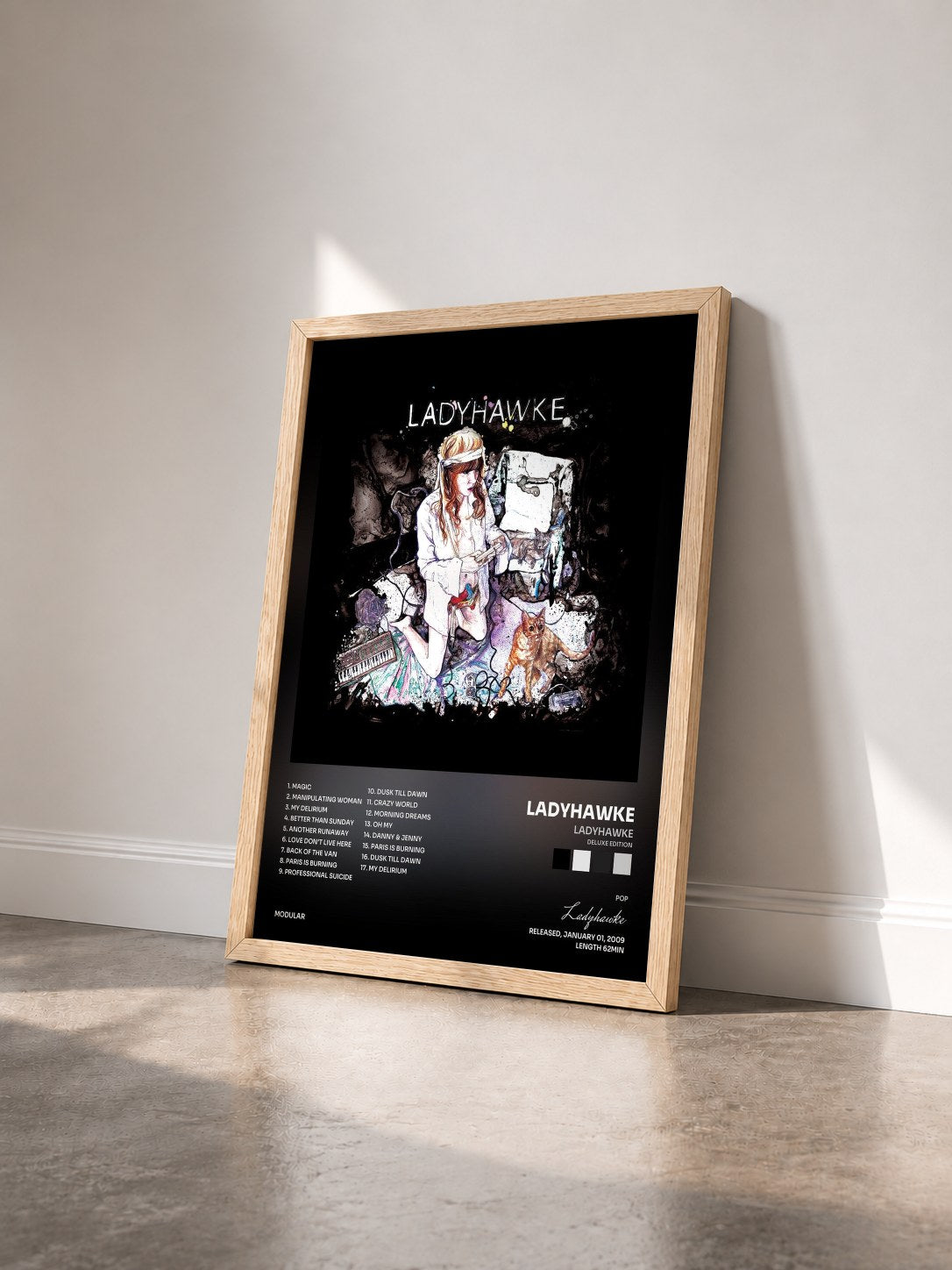 #bois Tableau de l'album Ladyhawke (Deluxe Edition) de Ladyhawke vu de trois quarts, cadre en bois brut
