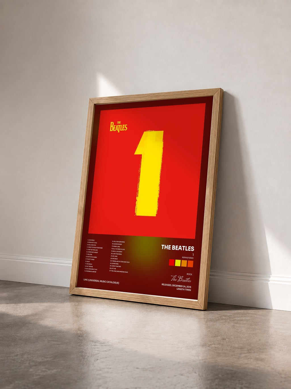#bois Tableau de l'album 1 (Remastered) de The Beatles vu de trois quarts, cadre en bois brut