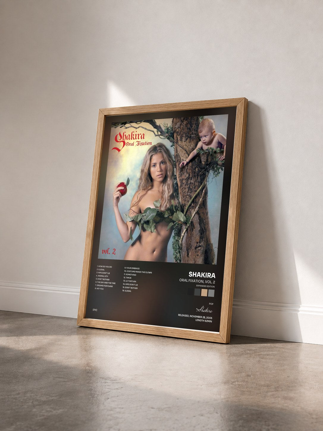 #bois Tableau de l'album Oral Fixation, Vol. 2 (Expanded Edition) de Shakira vu de trois quarts, cadre en bois brut