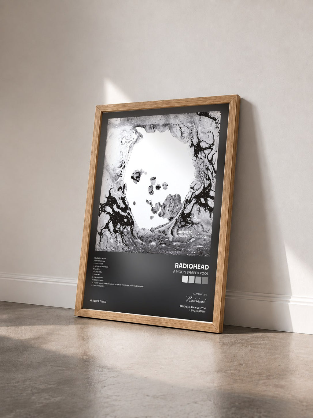 #bois Tableau de l'album A Moon Shaped Pool de Radiohead vu de trois quarts, cadre en bois brut