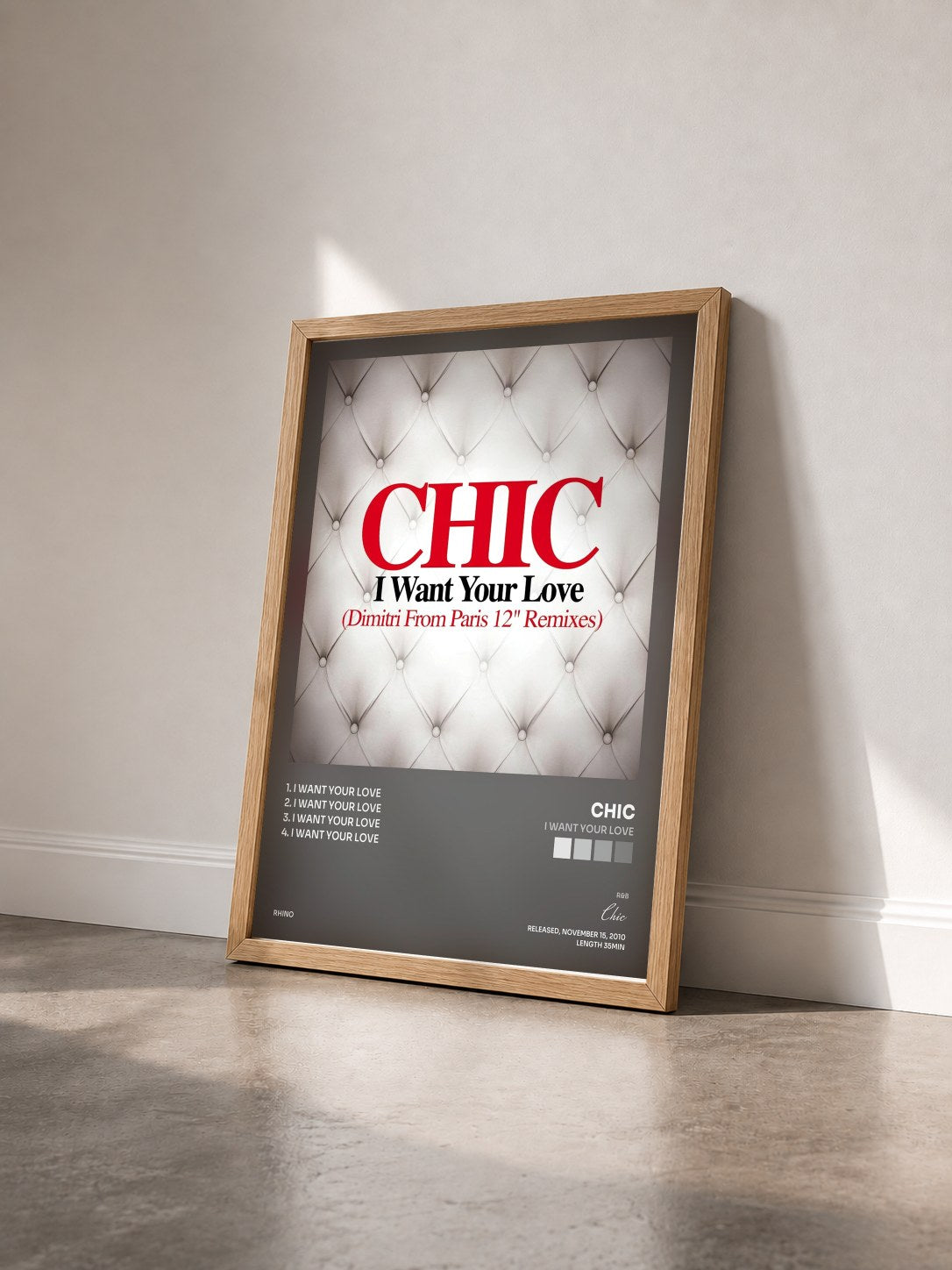 #bois Tableau de l'album I Want Your Love de Chic vu de trois quarts, cadre en bois brut