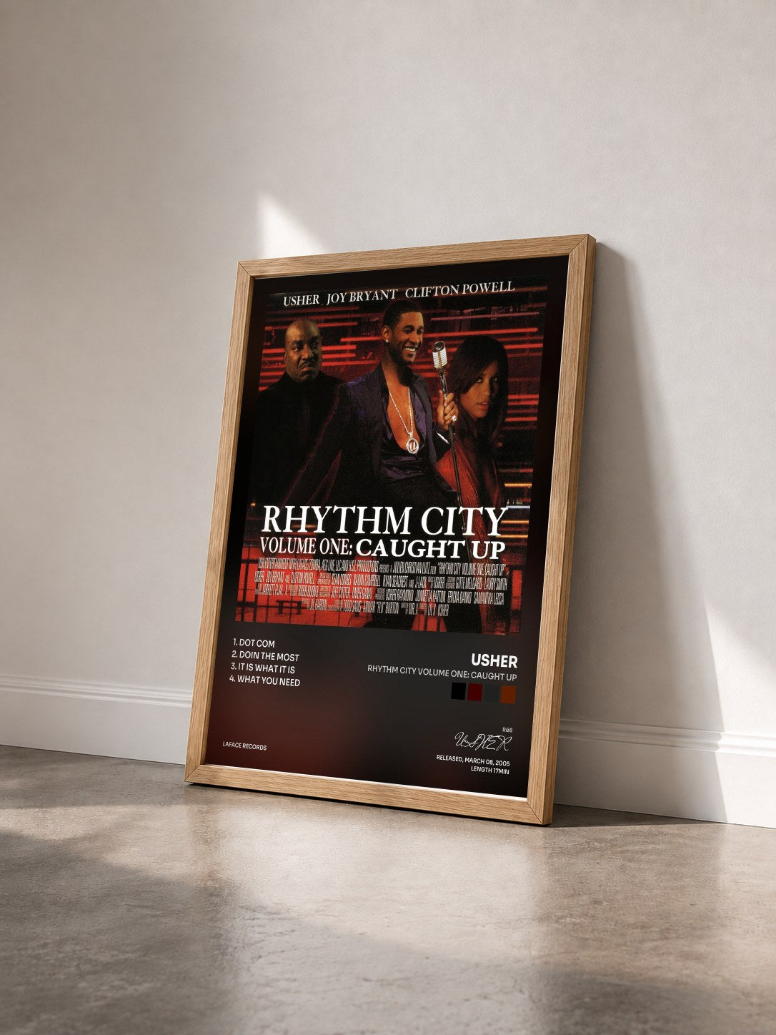 #bois Tableau de l'album Rhythm City Volume One: Caught Up de USHER vu de trois quarts, cadre en bois brut