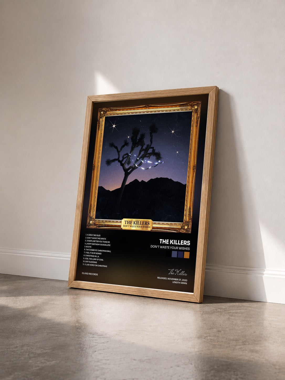 #bois Tableau de l'album Don't Waste Your Wishes de The Killers vu de trois quarts, cadre en bois brut