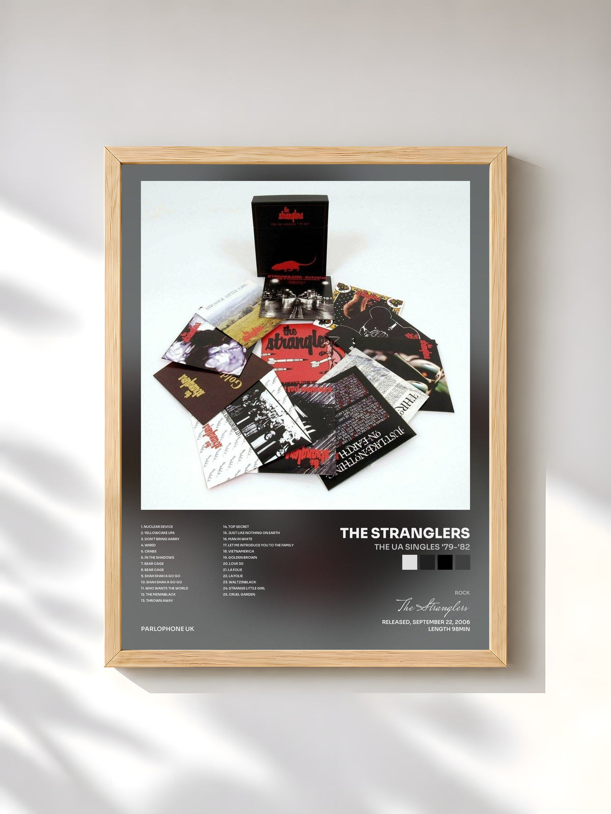 #bois Tableau de l'album The UA Singles '79-'82 de The Stranglers, cadre en bois brut, imprimé et encadré en France