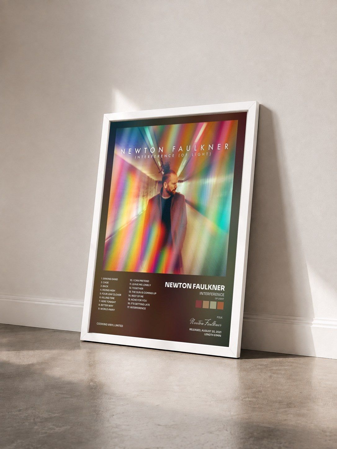 #blanc Tableau de l'album Interference (Of Light) de Newton Faulkner vu de trois quarts, cadre blanc