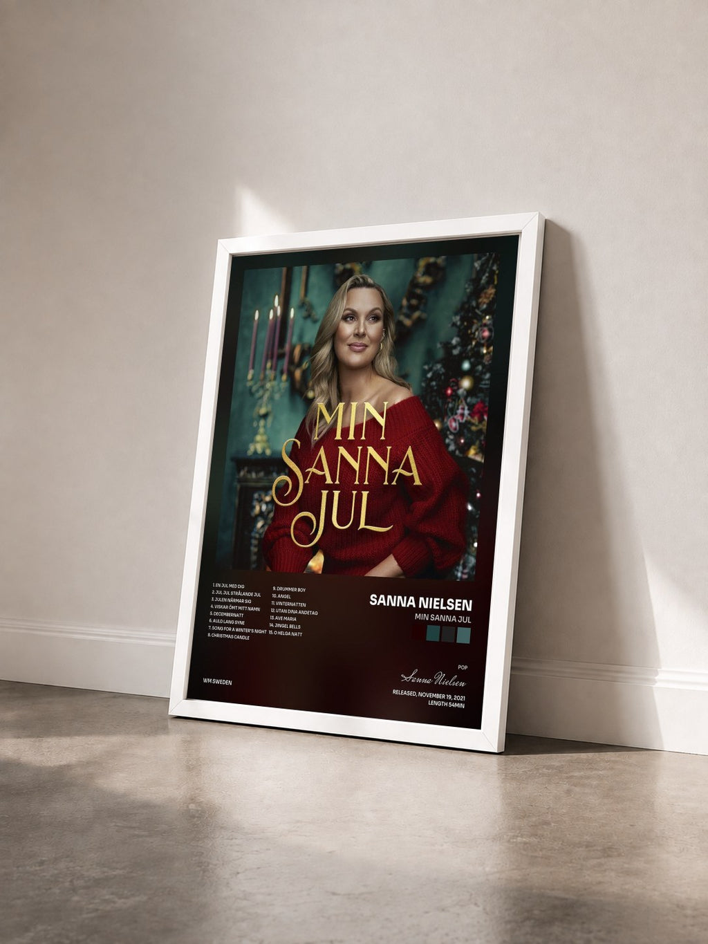 #blanc Tableau de l'album Min Sanna jul de Sanna Nielsen vu de trois quarts, cadre blanc