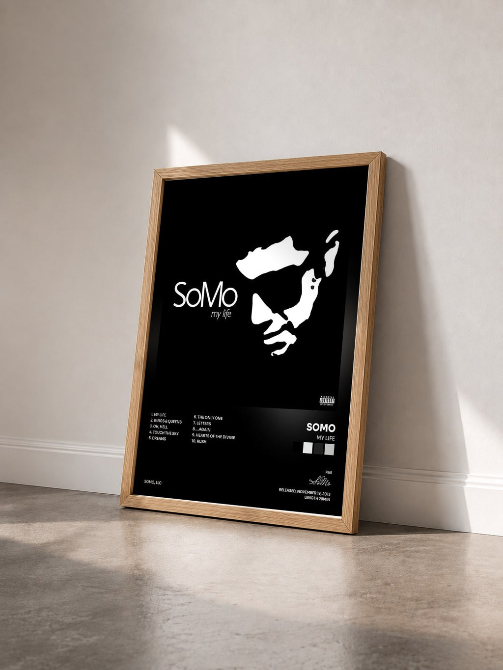 #bois Tableau de l'album My Life de SoMo vu de trois quarts, cadre en bois brut