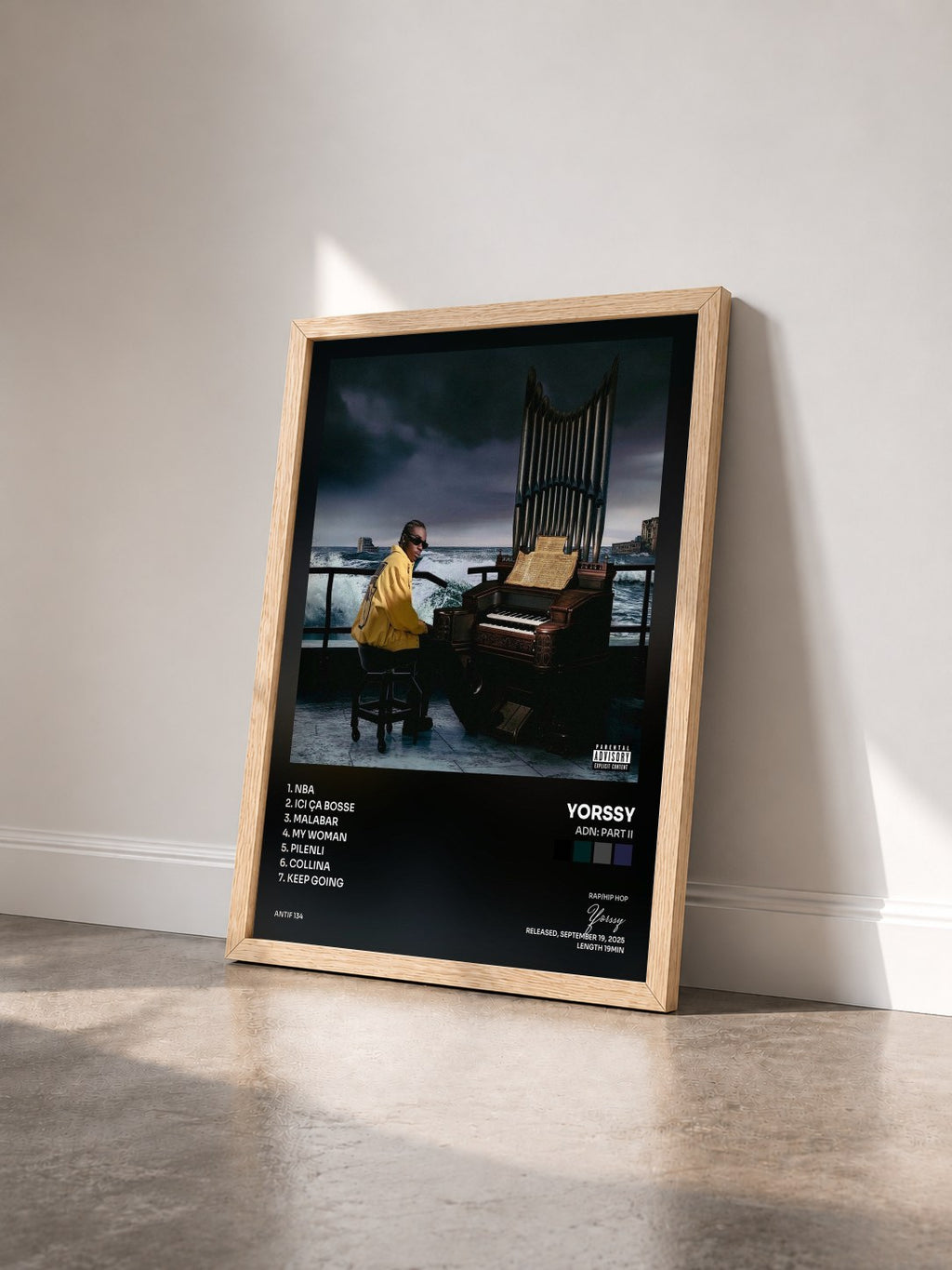 #bois Tableau de l'album ADN: PART II de Yorssy vu de trois quarts, cadre en bois brut