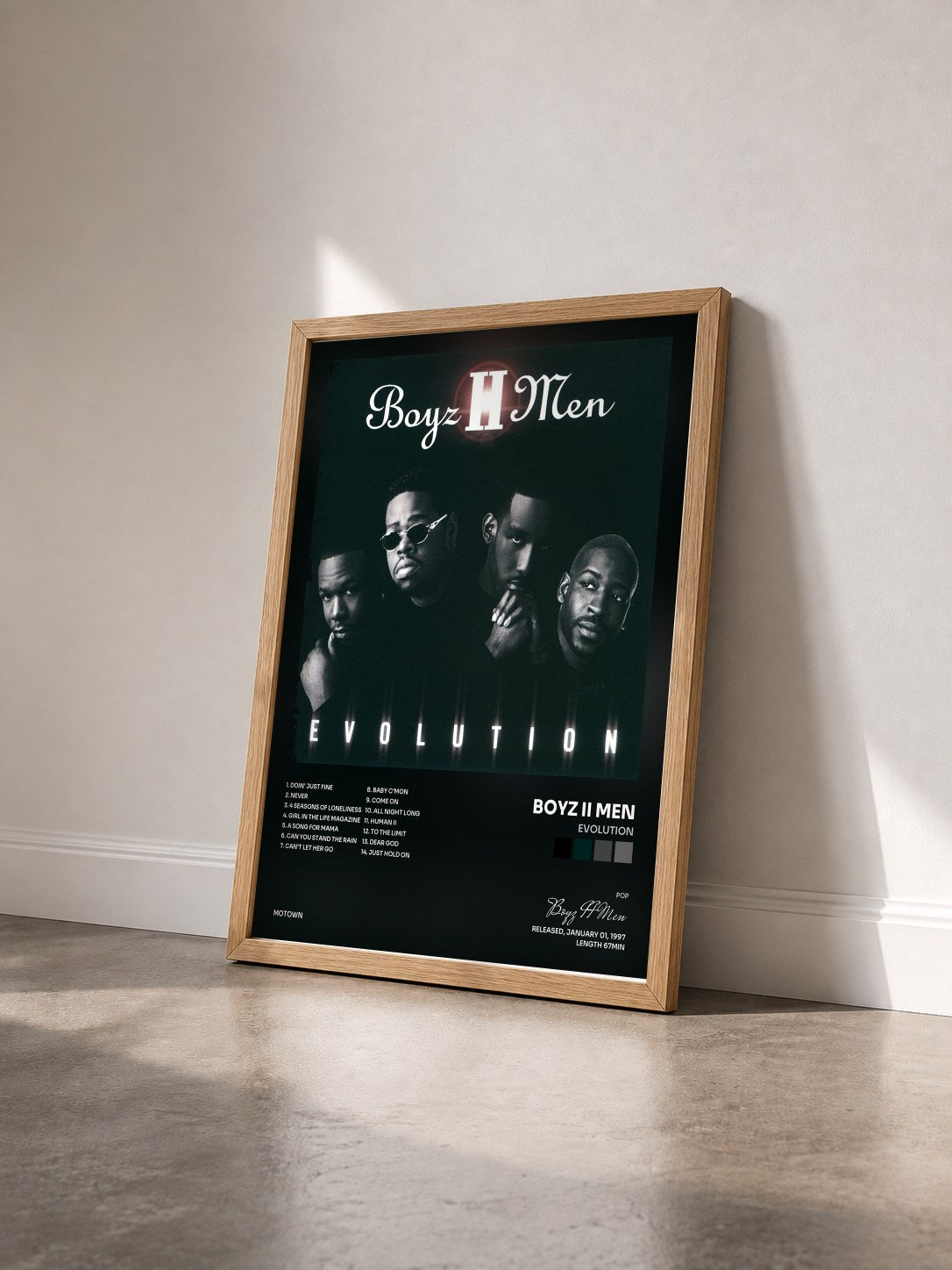 #bois Tableau de l'album Evolution de Boyz II Men vu de trois quarts, cadre en bois brut