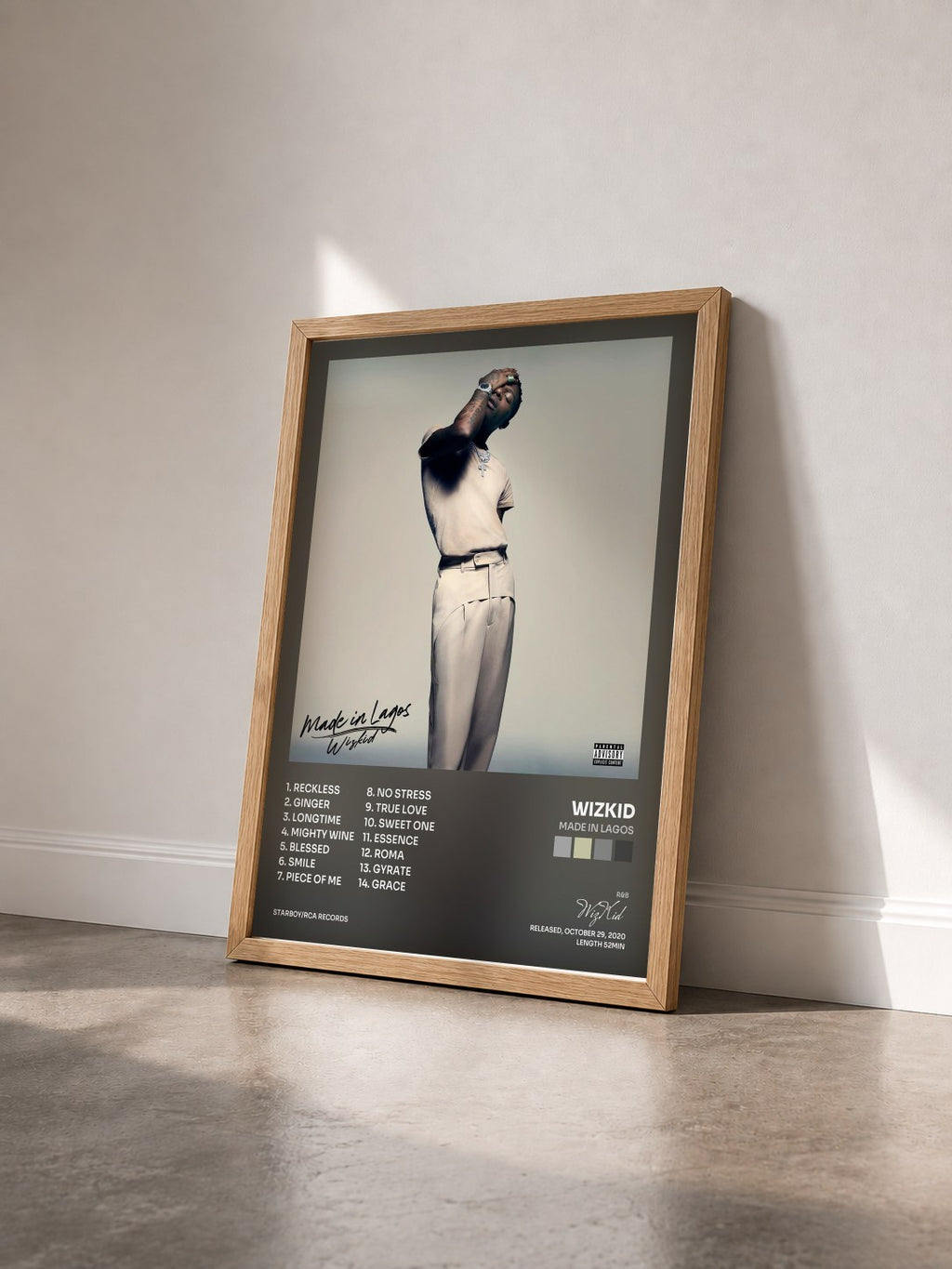 #bois Tableau de l'album Made In Lagos de WizKid vu de trois quarts, cadre en bois brut