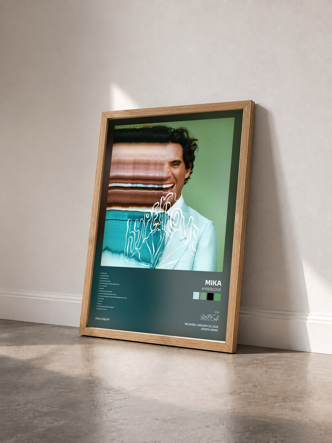 #bois Tableau de l'album Hyperlove de MIKA vu de trois quarts, cadre en bois brut