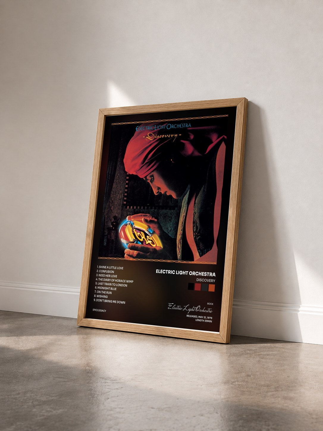 #bois Tableau de l'album Discovery de Electric Light Orchestra vu de trois quarts, cadre en bois brut