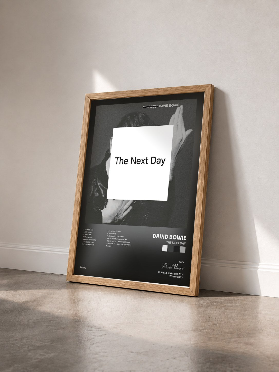 #bois Tableau de l'album The Next Day de David Bowie vu de trois quarts, cadre en bois brut
