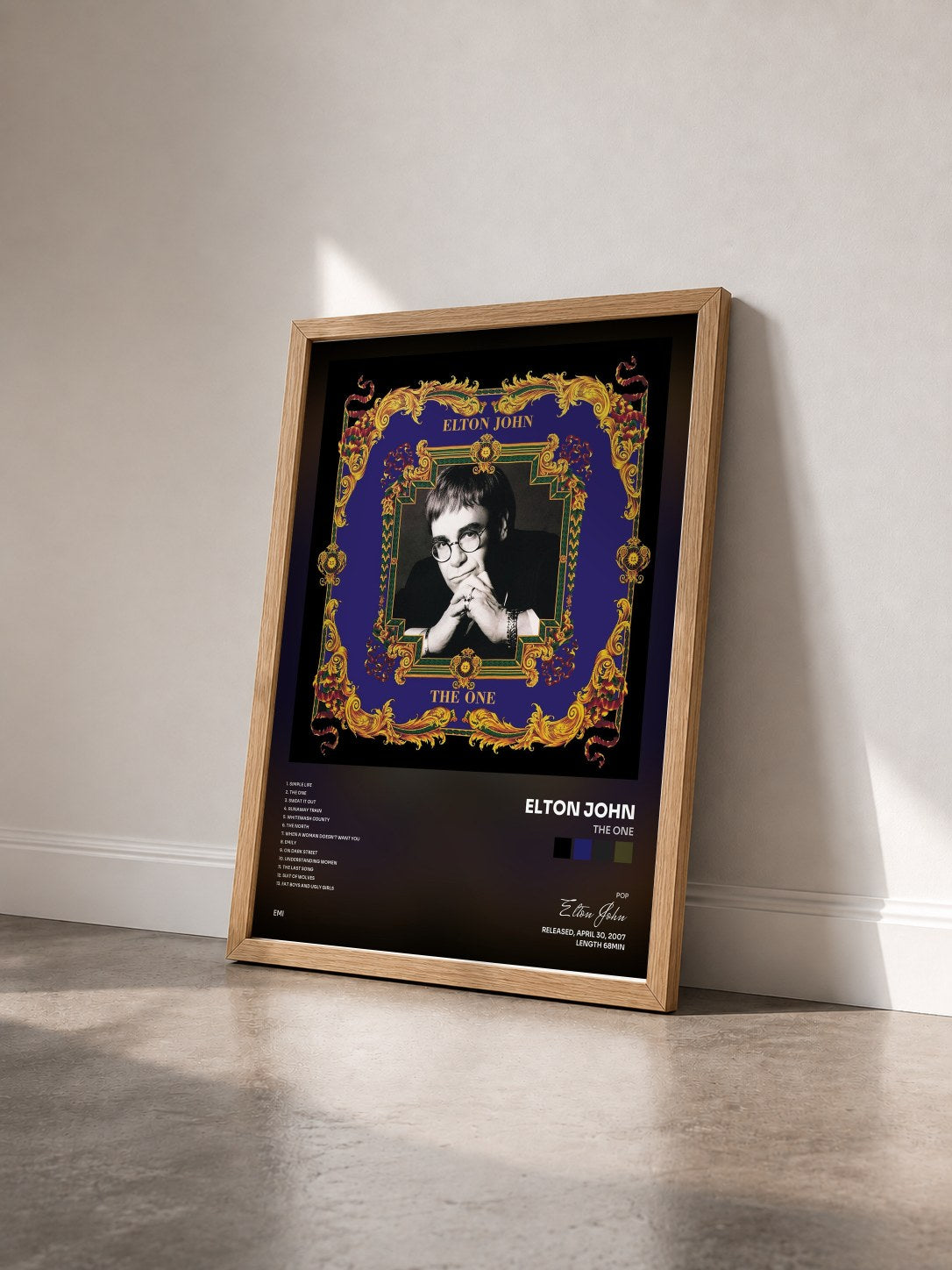 #bois Tableau de l'album The One de Elton John vu de trois quarts, cadre en bois brut