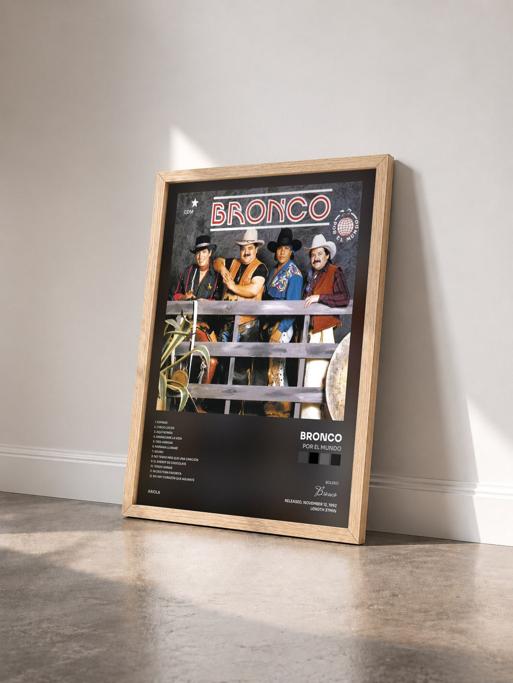 #bois Tableau de l'album Por El Mundo de Bronco vu de trois quarts, cadre en bois brut