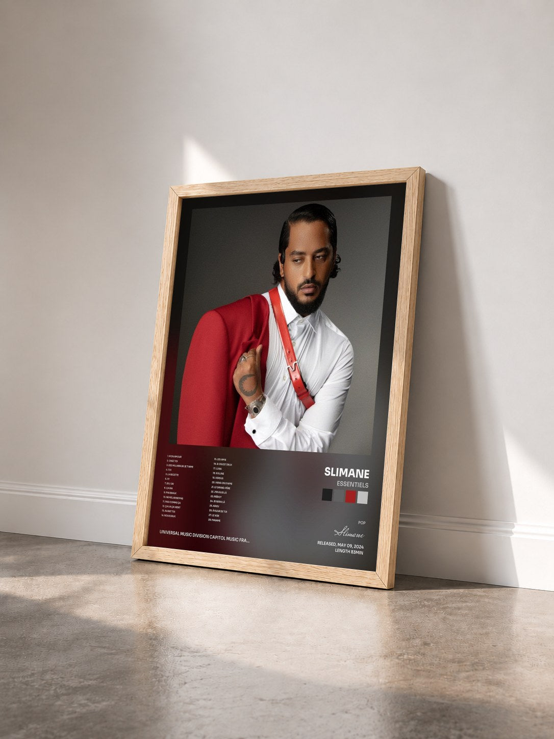 #bois Tableau de l'album Essentiels de Slimane vu de trois quarts, cadre en bois brut