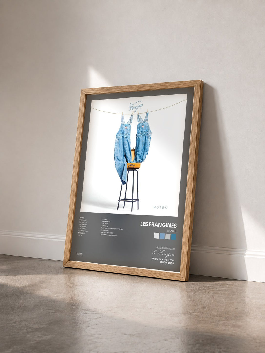 #bois Tableau de l'album Notes de Les Frangines vu de trois quarts, cadre en bois brut