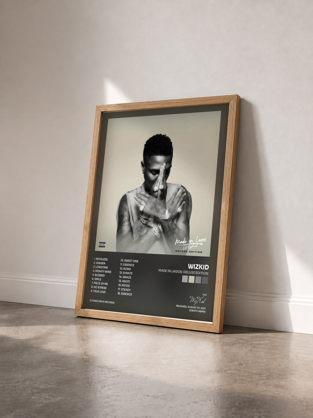 #bois Tableau de l'album Made In Lagos: Deluxe Edition de WizKid vu de trois quarts, cadre en bois brut