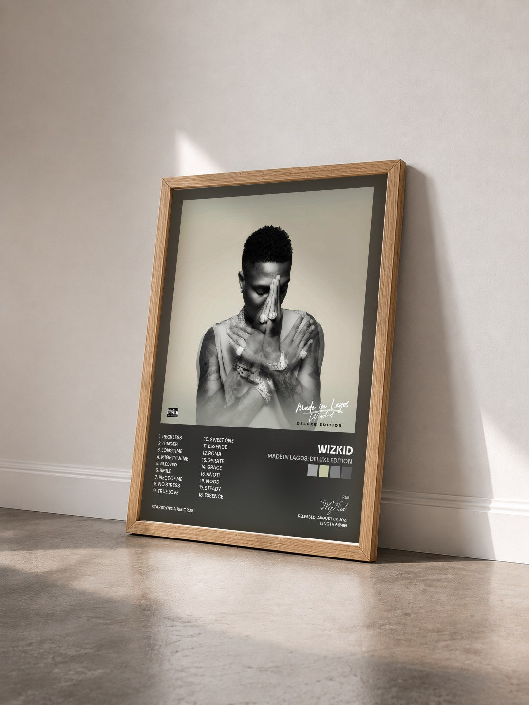 #bois Tableau de l'album Made In Lagos: Deluxe Edition de WizKid vu de trois quarts, cadre en bois brut