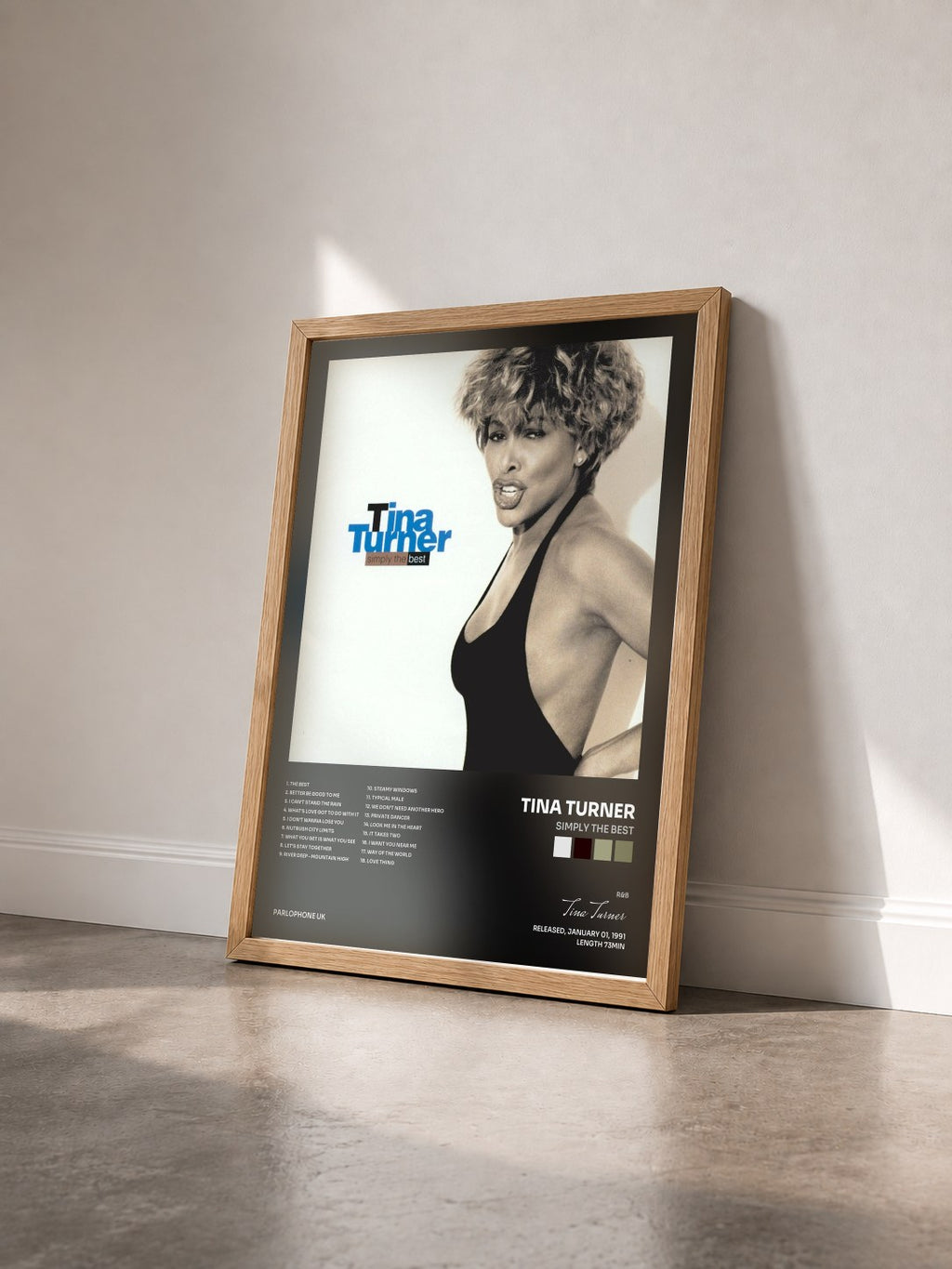 #bois Tableau de l'album Simply the Best de Tina Turner vu de trois quarts, cadre en bois brut