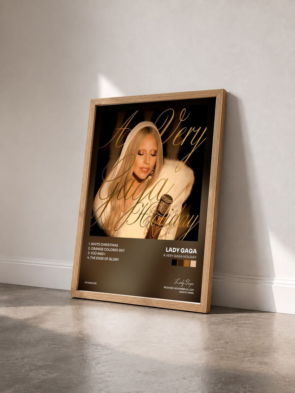 #bois Tableau de l'album A Very Gaga Holiday de Lady Gaga vu de trois quarts, cadre en bois brut