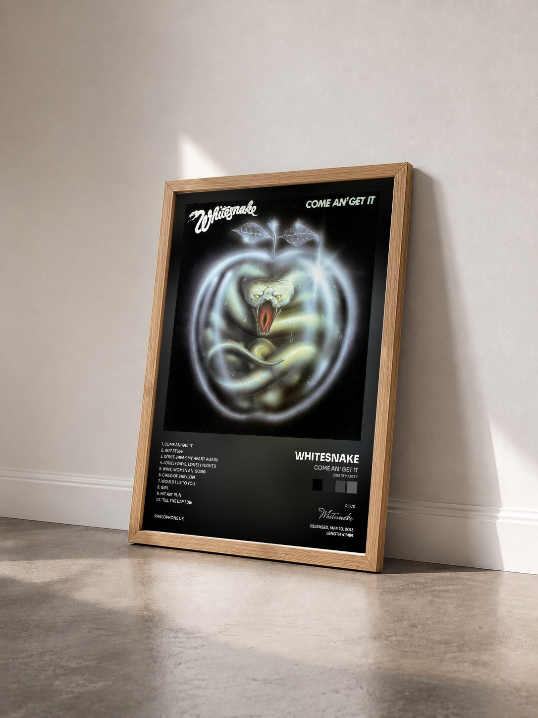 #bois Tableau de l'album Come an' Get It (2013 Remaster) de Whitesnake vu de trois quarts, cadre en bois brut