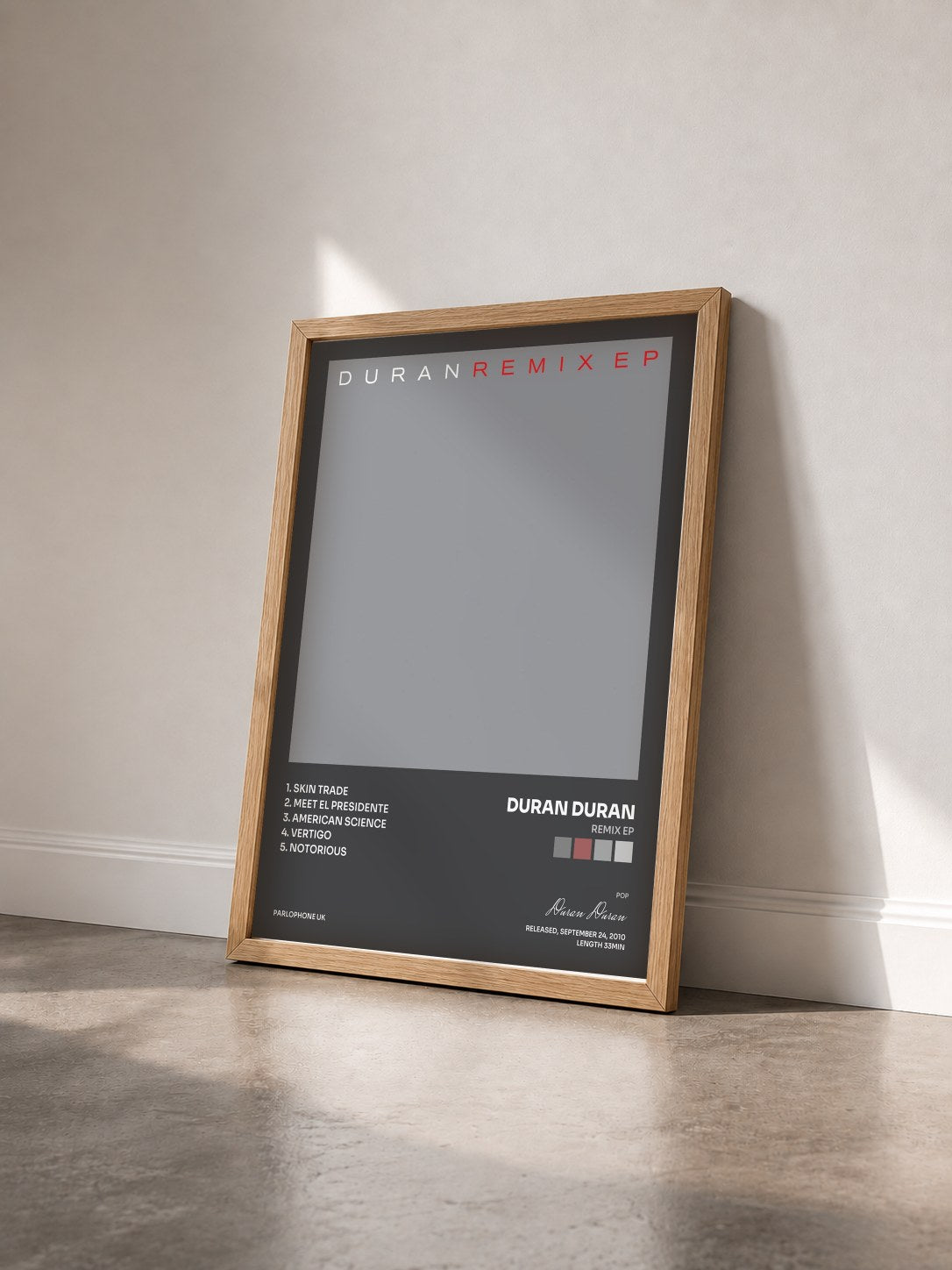 #bois Tableau de l'album Remix EP de Duran Duran vu de trois quarts, cadre en bois brut